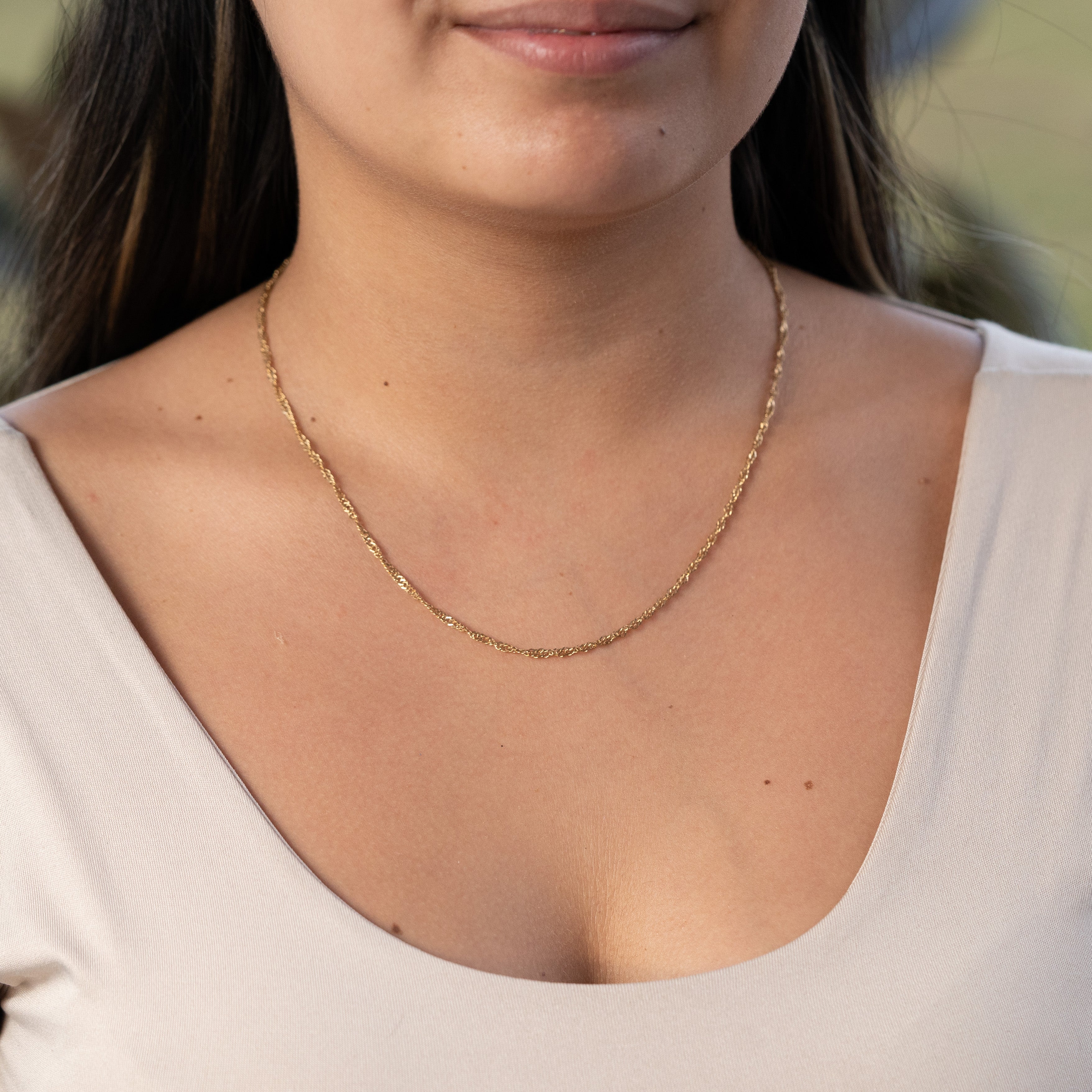 Cadena Singapur Mujer